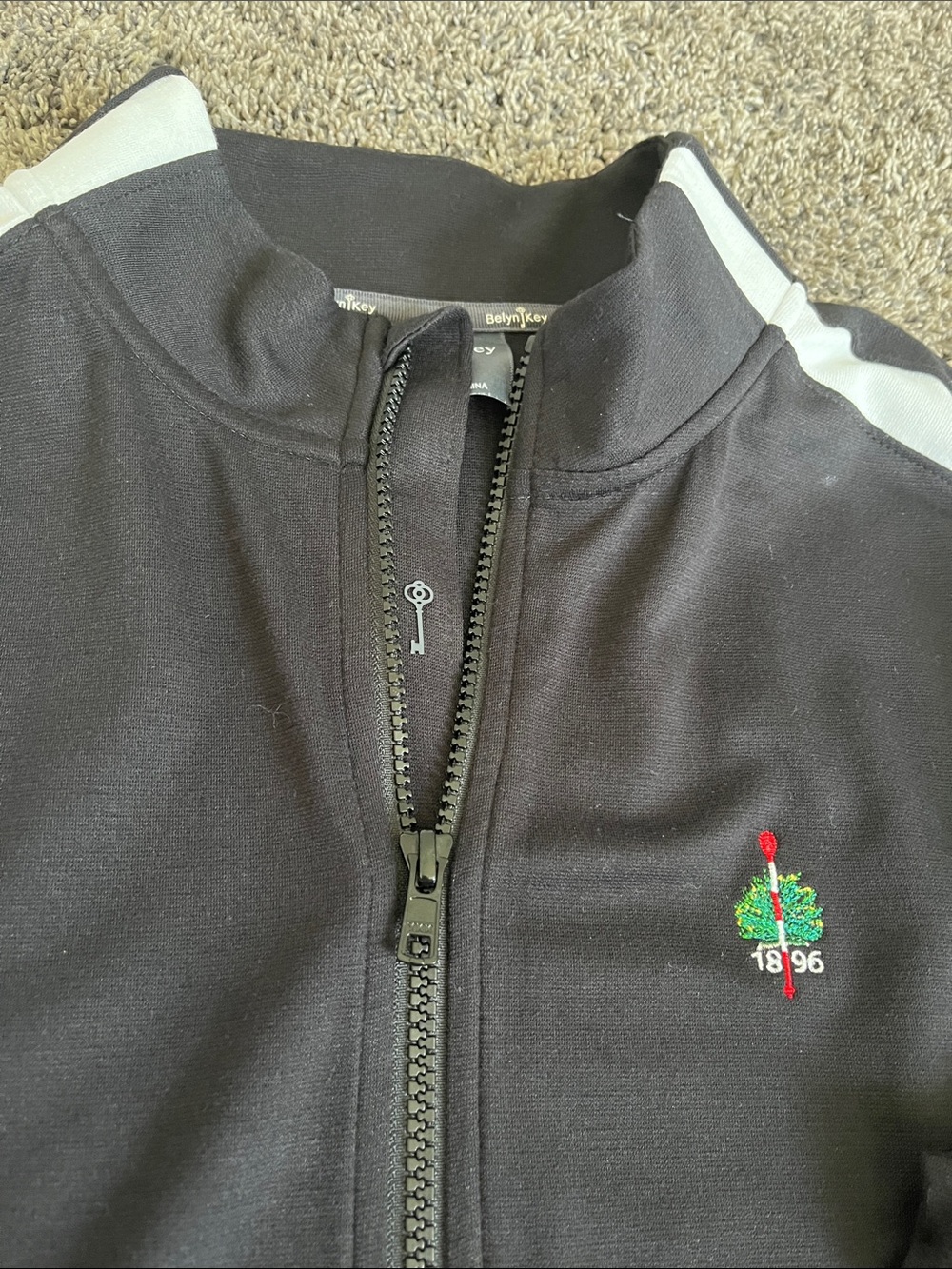 Merion Golf Club. Ladies Belyn Key Black Jacket w/White Shoulder Stripes. New LG